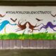 Mural “Boal por los buenos tratos” diseñado por María Torres y realizado por alumnos y alumnas del concejo.