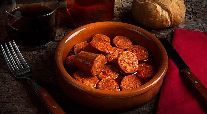 Chorizos a la sidra