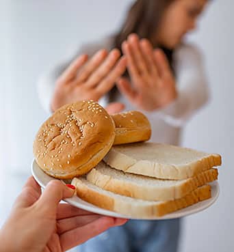 Mujer con la enfermedad celiaca.
